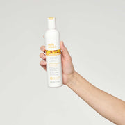 milk-shake-new-color-conditioner-in-hand